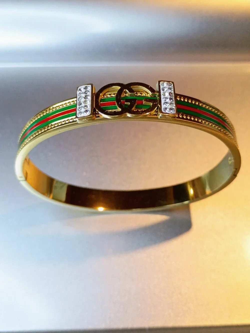 New Gold-Tone Green & Red Stripe Bangle Bracelet with Crystal Logo